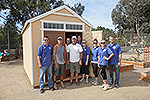 Photo of Councilmember Sherman and his staff in front of freshly painted shed at the San Carlos Community Garden