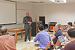 Photo of Councilman Sherman speaking to a class of future journalists and media advisors at San Diego State University